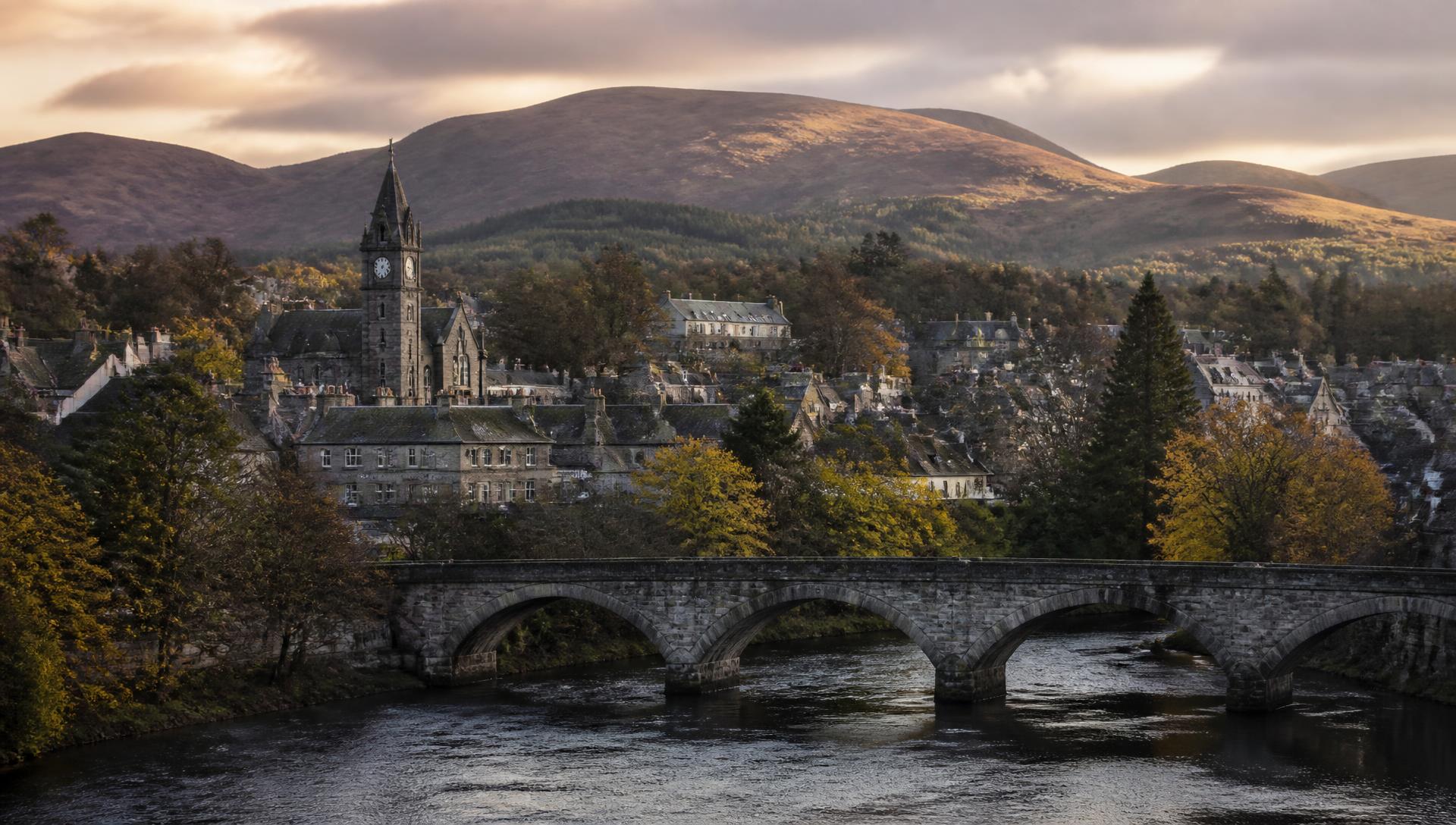 Pitlochry town, the River Tummel bridge and the Perthshire hills